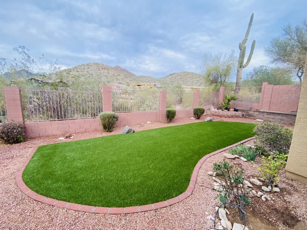 Artificial turf installed by a gate