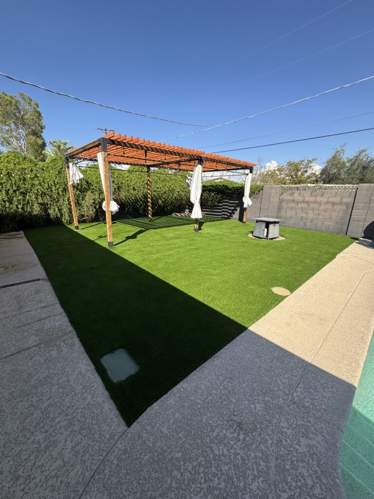 Artificial turf installation in Scottsdale using premium TigerTurf with a fully engineered drainage system, laser-graded base, and clean finished edges by All Valley Turf.