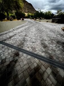 Luxury paver driveway before and after sealing at Desert Foothills Golf Club in Cave Creek Arizona by All Valley Turf