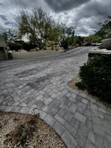 Luxury paver driveway before and after sealing at Desert Foothills Golf Club in Cave Creek Arizona by All Valley Turf