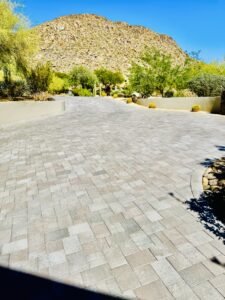 Luxury paver driveway after sealing at Desert Foothills Golf Club in Cave Creek Arizona with premium wet-look finish by All Valley Turf